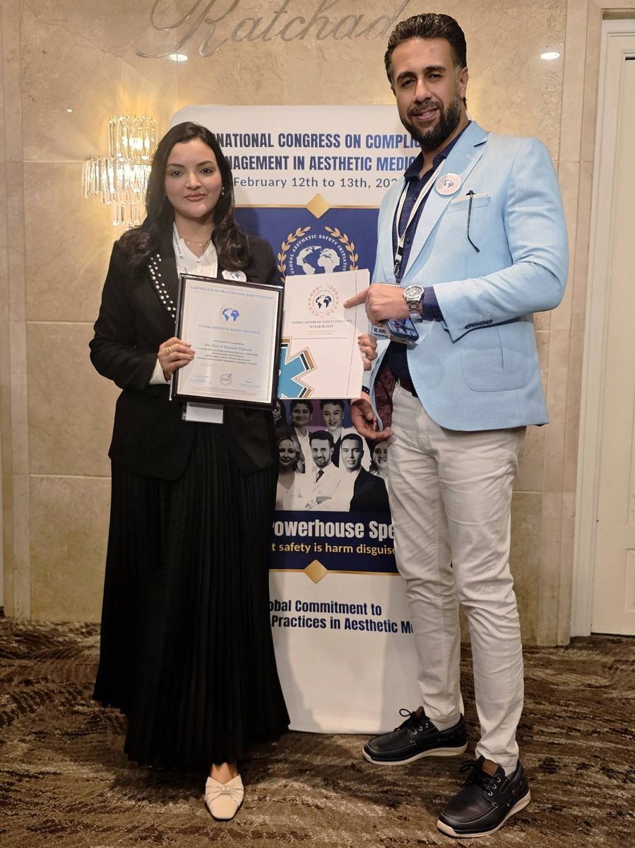 Dr. Tasmin Tahnin Siha and a colleague each holding a certificate at the Global Aesthetic Safety Initiative congress in Bangkok.
